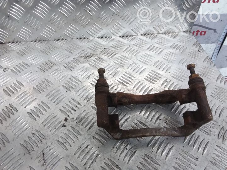 Audi 100 200 5000 C3 Supporto della pinza del freno anteriore 