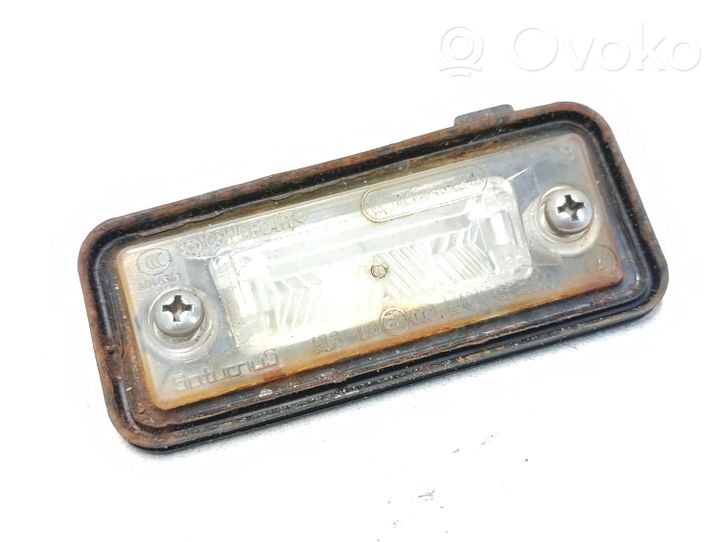 Audi A6 S6 C4 4A Lampa oświetlenia tylnej tablicy rejestracyjnej 1T0827634