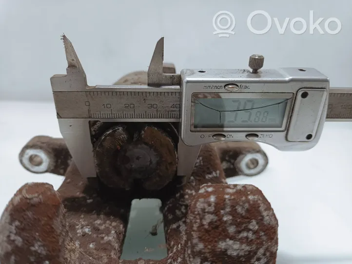 Skoda Octavia Mk2 (1Z) Tylny zacisk hamulcowy 