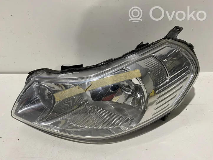 Suzuki SX4 Lampa przednia 10016684