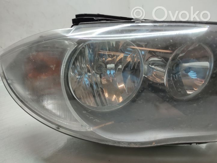 BMW 1 E81 E87 Lampa przednia 7249652