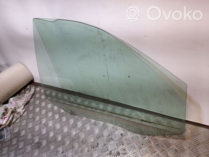 Volkswagen Routan Front door window glass four-door 