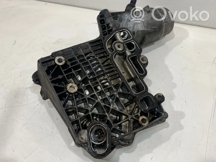 Opel Antara Supporto di montaggio del filtro dell’olio 96868256