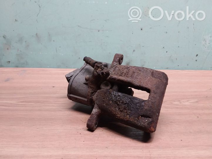 Volkswagen PASSAT B7 Caliper del freno trasero 