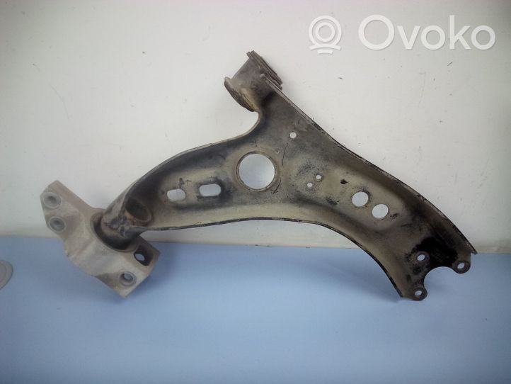 Volkswagen PASSAT B7 Fourchette, bras de suspension inférieur avant 1K0407165C