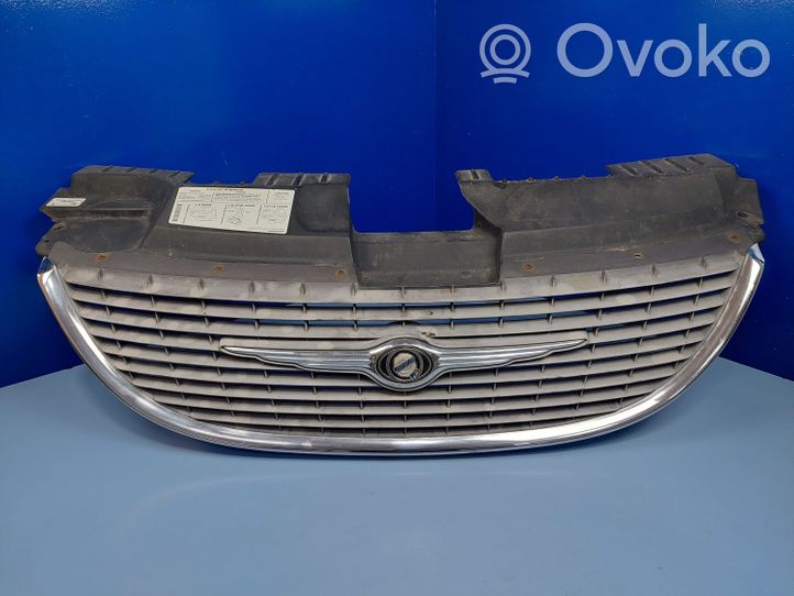 Chrysler Voyager Maskownica / Grill / Atrapa górna chłodnicy 04857410AC