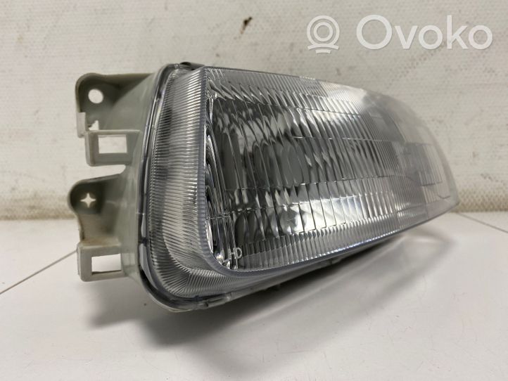 Mazda 323 Lampa przednia 082161126M