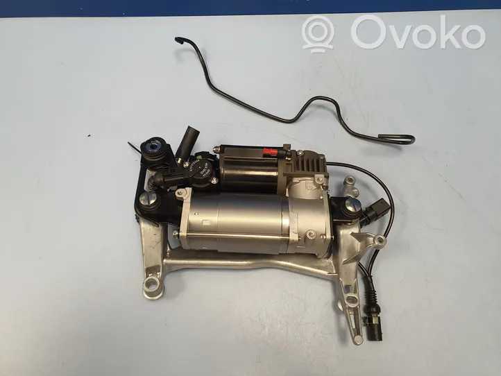 Volkswagen Touareg I Air suspension compressor/pump 7L0616007A