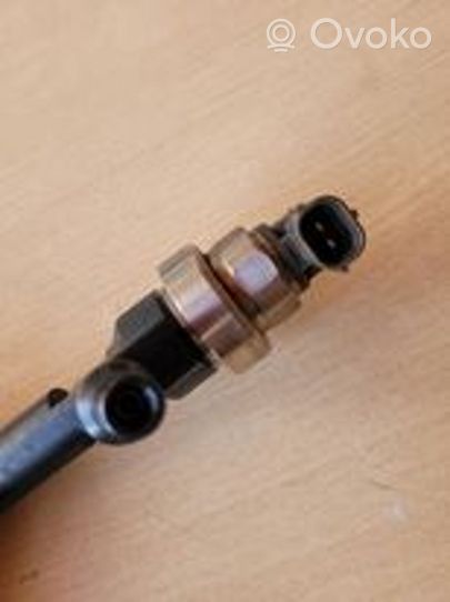 Opel Astra J Injecteur de carburant 55567729