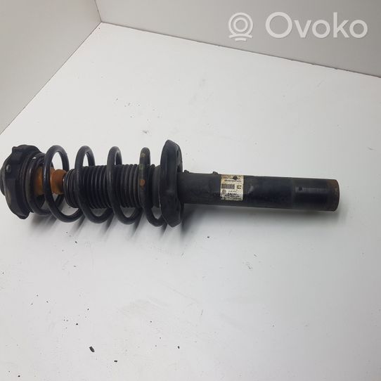 Volkswagen PASSAT B7 USA Front shock absorber with coil spring 561413031K