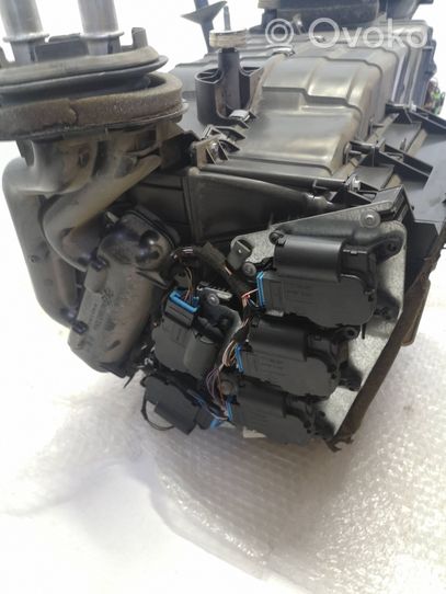 Volkswagen Touareg I Interior heater climate box assembly 7L0819096