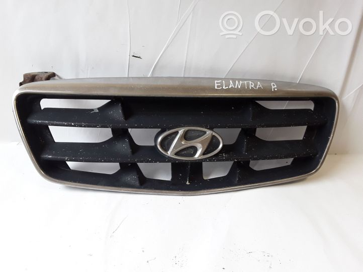 Hyundai Elantra Front bumper upper radiator grill 863512D000
