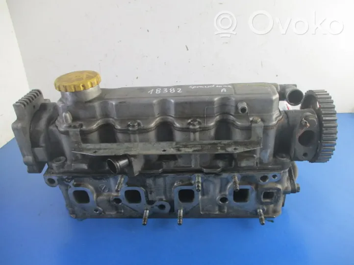 Opel Corsa B Engine head 90400110