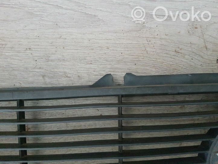 Volkswagen Golf I Front bumper upper radiator grill 171853653D