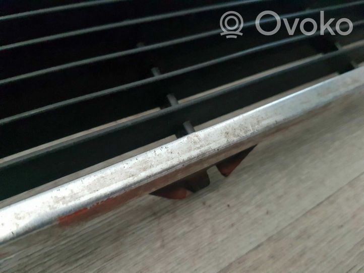 Volkswagen Golf I Front bumper upper radiator grill 171853653H