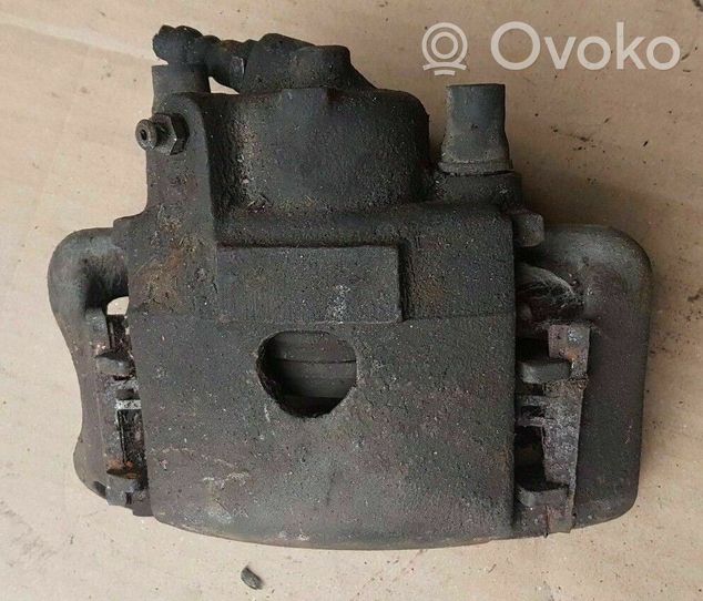 Volkswagen Golf I Caliper de freno delantero 171615124B