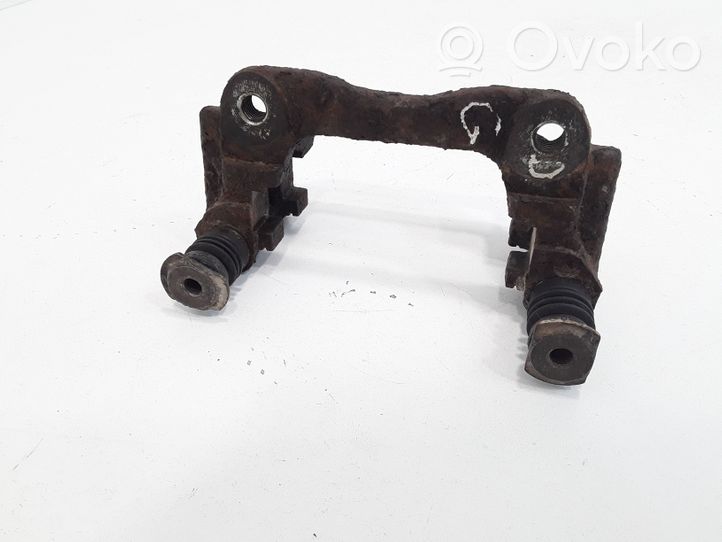 Toyota Avensis T250 Supporto della pinza del freno posteriore 0204Y01338