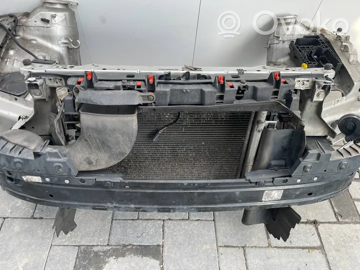 Opel Astra J Jäähdyttimen kehyksen suojapaneelin kiinnike 