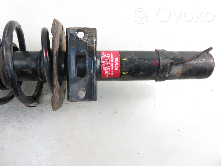 Hyundai Solaris I Front shock absorber with coil spring 