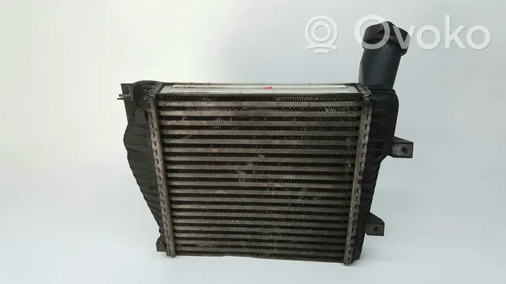 Volkswagen Touareg I Chłodnica powietrza doładowującego / Intercooler 