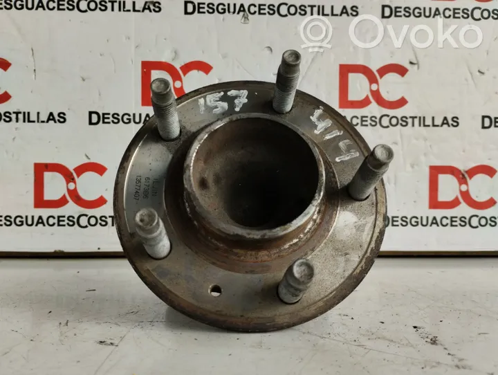 Opel Astra J Mozzo con cuscinetto ruota anteriore 13577407