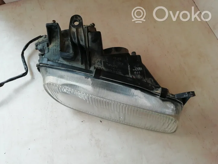 Mazda 323 F Faro/fanale 11061708