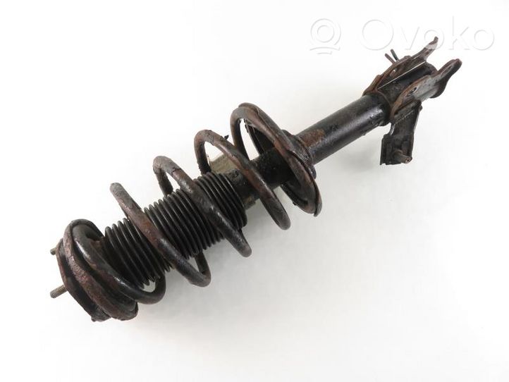 Nissan Almera N16 Front shock absorber with coil spring 