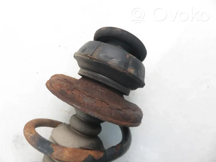 Dacia Logan I Front shock absorber with coil spring 