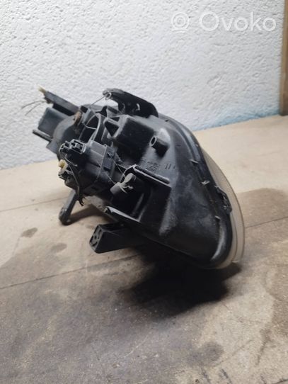 Suzuki Baleno EG Lampa przednia 10032617