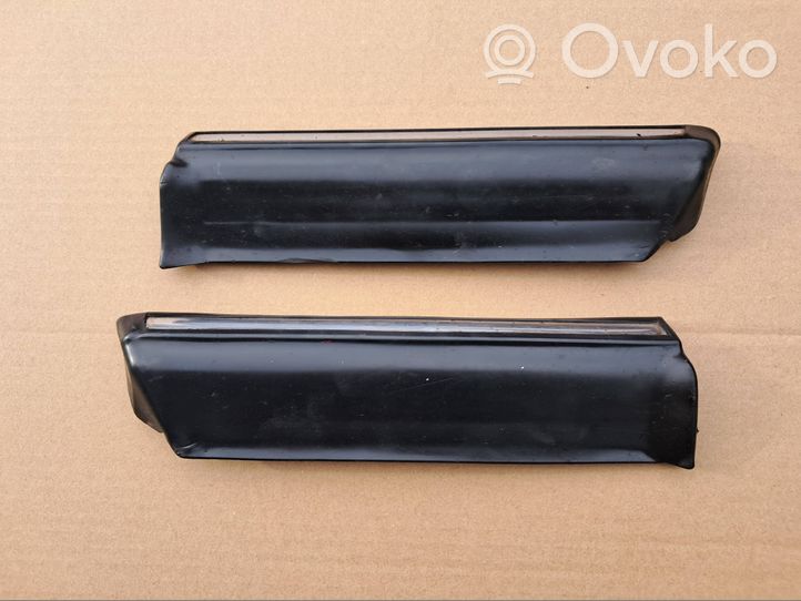 Mercedes-Benz W123 Rivestimento passaruota anteriore 1236903980