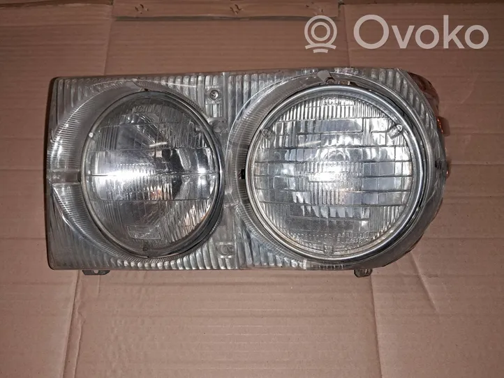 Mercedes-Benz SL R107 Lampa przednia 1305523033