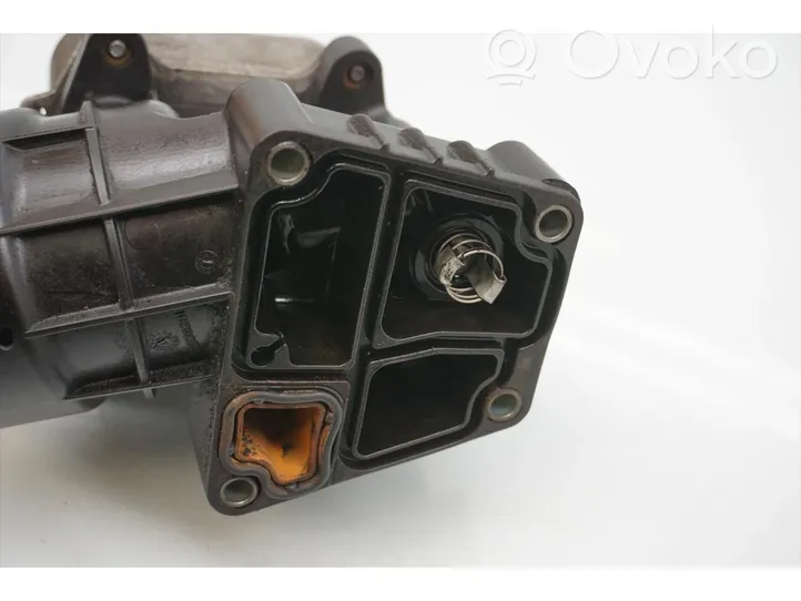 Volkswagen Polo V 6R Supporto di montaggio del filtro dell’olio 03P115389A