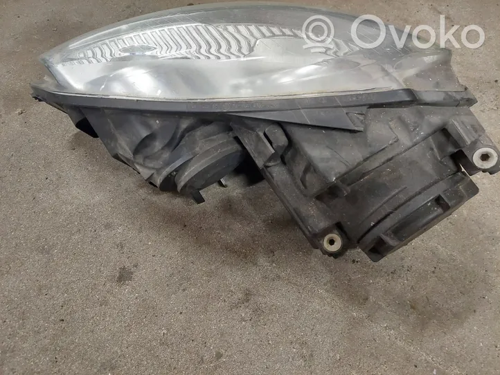 Volkswagen Golf V Lampa przednia 1K6941006R