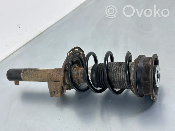 Volkswagen Golf VII Front shock absorber with coil spring 5Q0413023FK