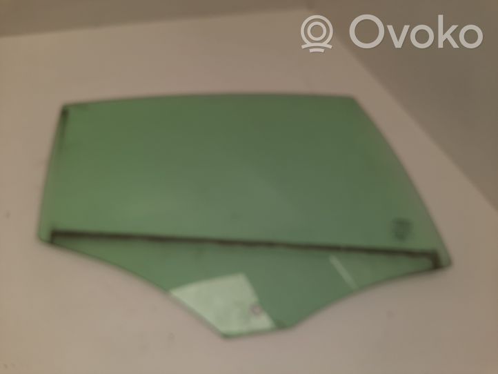 Volvo S60 Vetro del finestrino della portiera posteriore E000186