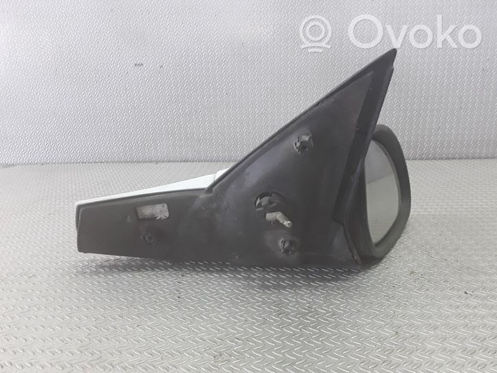 Opel Vectra B Manualne lusterko boczne drzwi przednich 0104460606