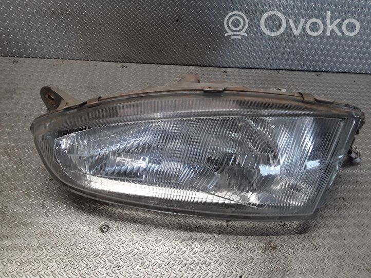 Mitsubishi Colt Faro delantero/faro principal 10087148