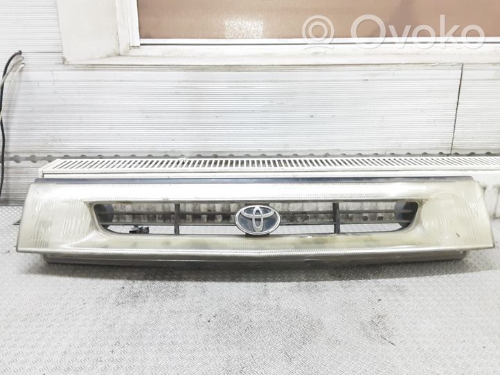 Toyota Previa (XR10, XR20) I Grille calandre supérieure de pare-chocs avant 11475519A