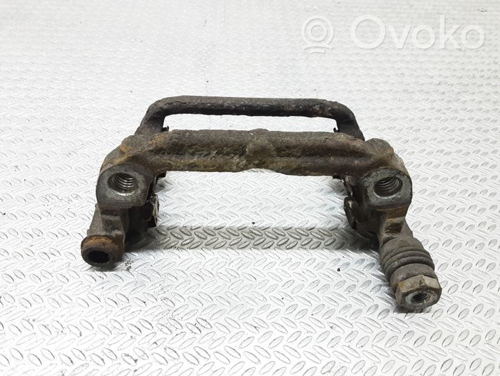 Opel Astra J Supporto della pinza del freno posteriore 