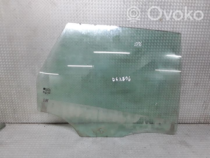 Opel Astra J Rear door window glass 