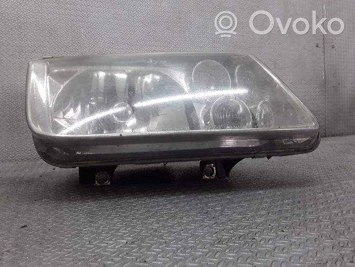 Volkswagen Jetta IV Lampa przednia 205653B