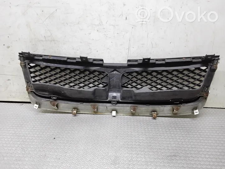 Suzuki Grand Vitara II Maskownica / Grill / Atrapa górna chłodnicy 7174365J0