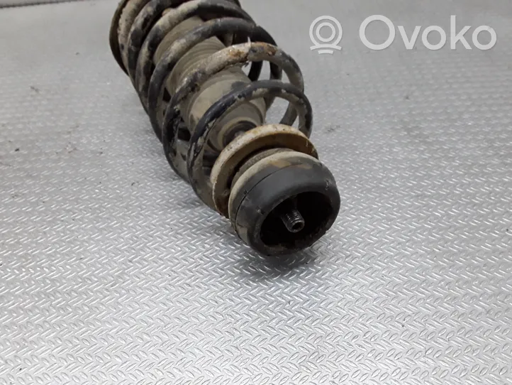 Volkswagen Golf IV Front shock absorber with coil spring 1J0413031T