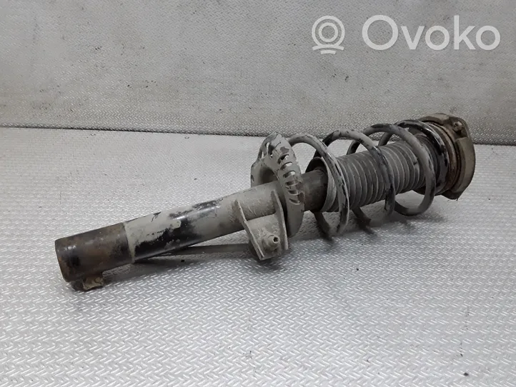 Volkswagen Golf V Front shock absorber with coil spring 