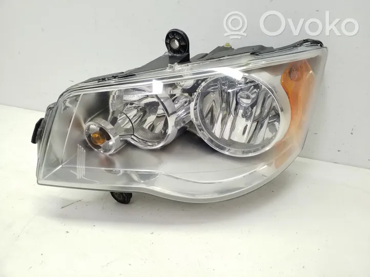 Dodge Grand Caravan Lampa przednia 05113337AE