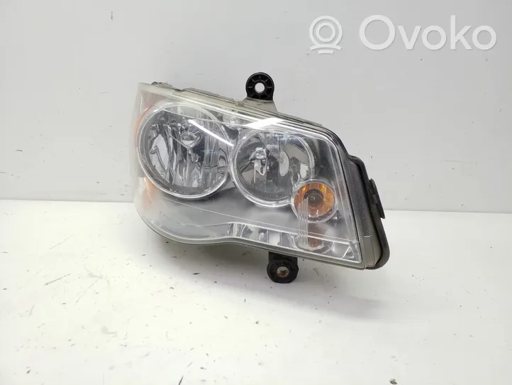 Dodge Grand Caravan Lampa przednia 05113336AG