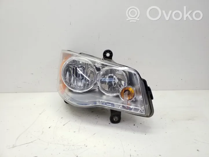 Dodge Grand Caravan Lampa przednia 05113336AG