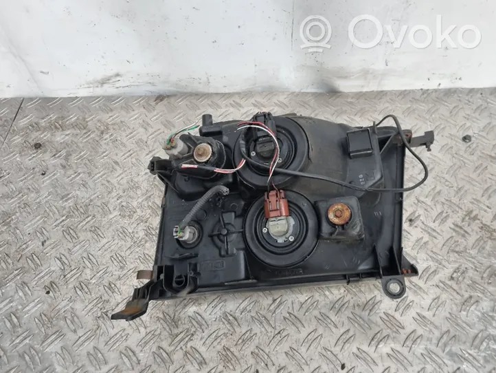 Toyota Land Cruiser (J100) Lampa przednia 6067