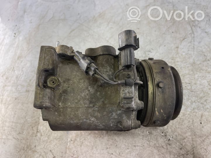 Mitsubishi Pajero Sport I Compresor (bomba) del aire acondicionado (A/C)) Mr360532