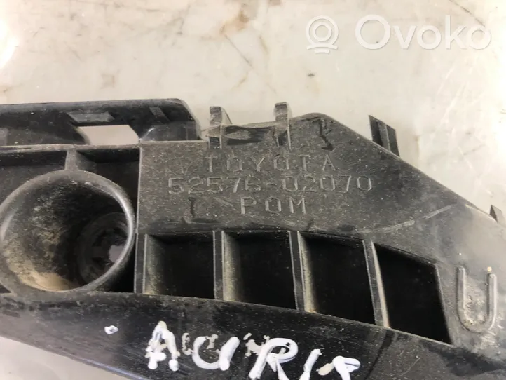 Toyota Auris 150 Uchwyt / Mocowanie zderzaka tylnego 5257602070